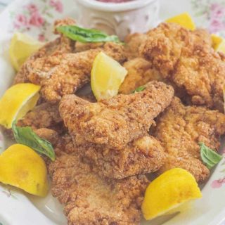 Southern Fried Catfish. Marinated in buttermilk, breaded in seasoned cornmeal and fried until golden brown and crispy.