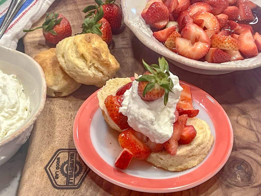 strawberry shortcakes and fixings for JHomemade Strawberry Shortcake with Vanilla Whipped Cream