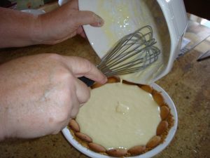 Adding filling into crust.