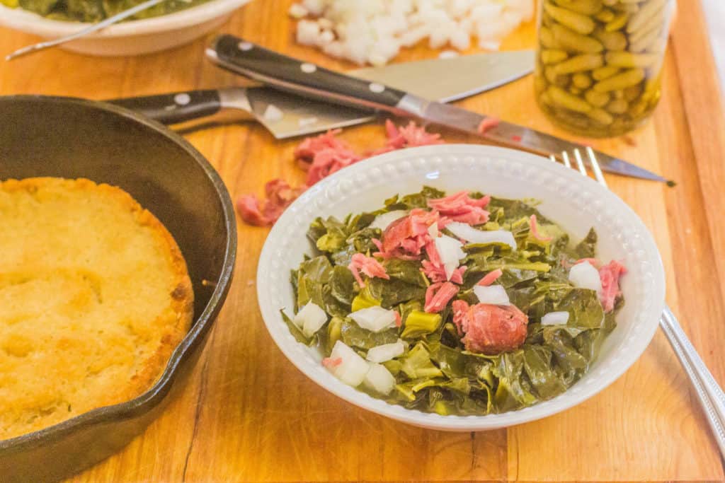 Southern-Style Collard Greens with Ham Hocks in bowl.