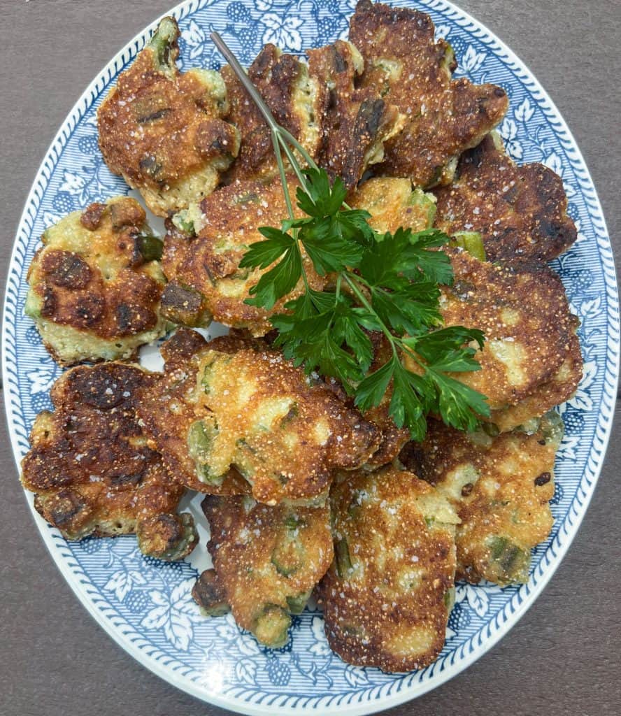 Okra Fritters on a blue and white platter