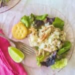 West Indies Salad. Fresh crabmeat marinates overnight with sweet onion and vinaigrette. Serve with lemon or lime atop fresh salad greens.