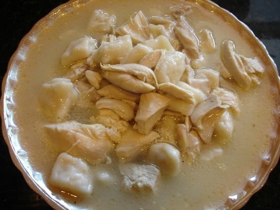 chicken and dumplings in bowl.