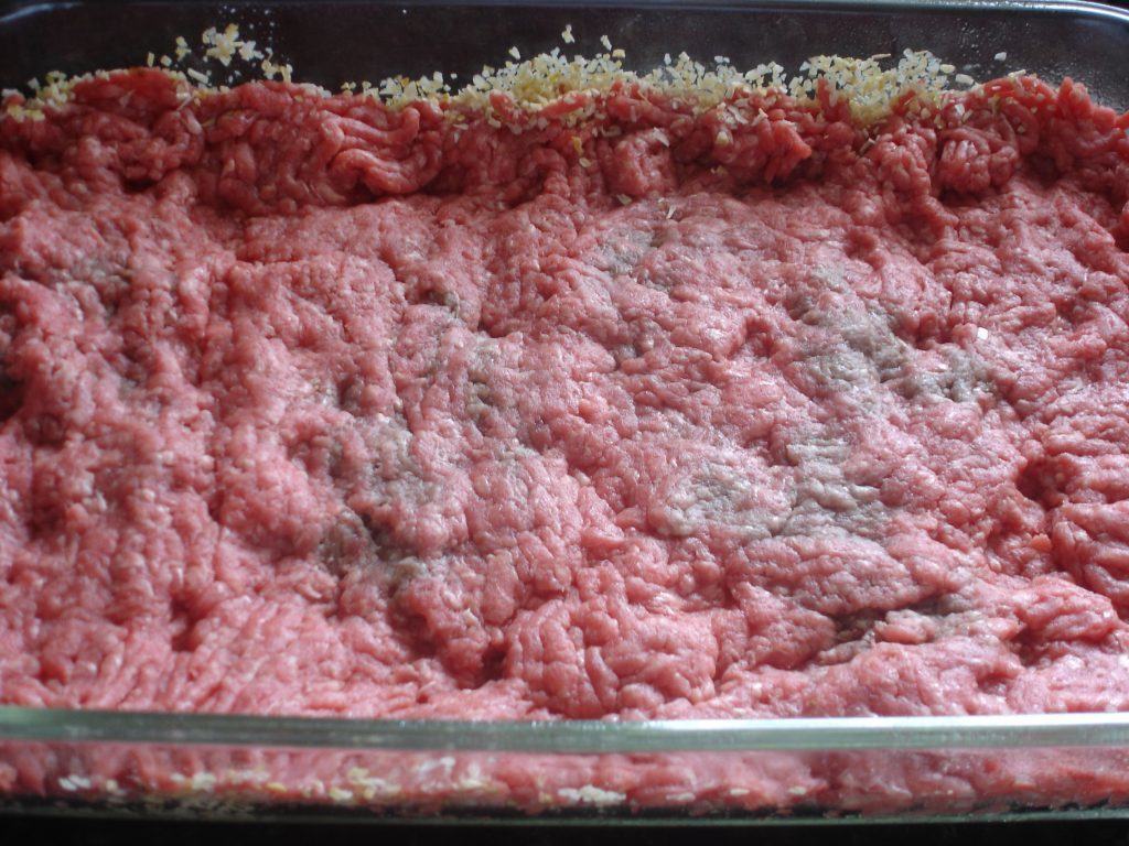 Ground beef on top of dehydrated onions