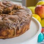 Apple Dapple Cake. A vintage hand-me-down recipe. Fresh apples and pecans are held together by just the right amount of cinnamon vanilla batter. The hot cake is topped with a freshly made caramel glaze. A family favorite.