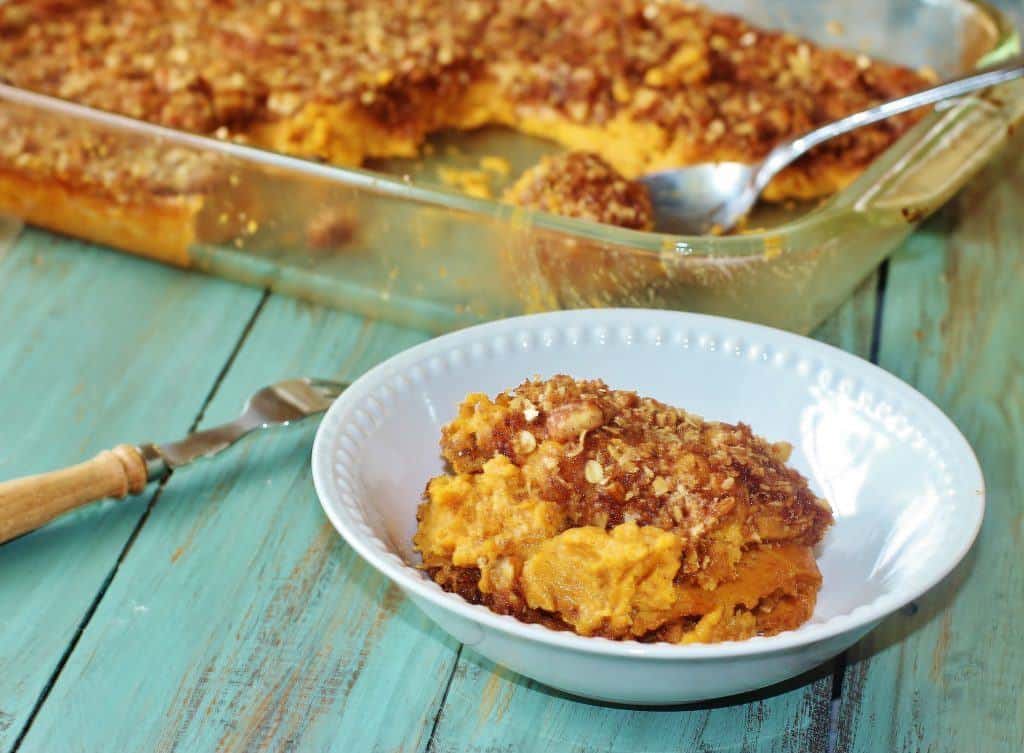Sweet Potato Casserole. A Thanksgiving tradition. Sweet potatoes are mashed, sweetened and flavored with spices then topped with an oatmeal