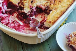 Southern Blackberry Cobbler. An iconic Southern dessert. Blackberries are gently stewed and pour over a three ingredient, biscuit like topping.