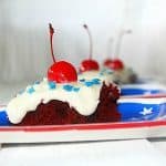 red velvet brownies on a paper plate