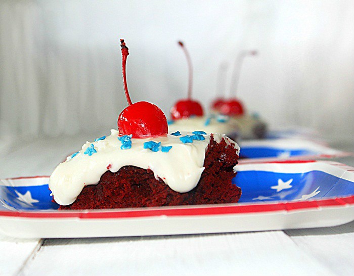 red velvet brownies on a paper plate