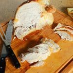 brined turkey breast on a cutting board