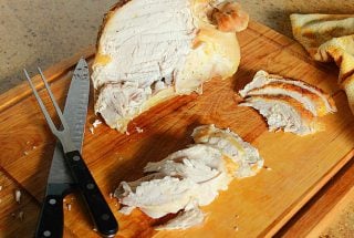 brined turkey breast on a cutting board