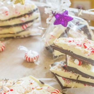 Peppermint Bark is an easy and elegant Christmas gift. It's a cinch to make with only four ingredients and contains layers of semi-sweet and white chocolate. It's topped with crushed peppermint candy for a festive appearance.