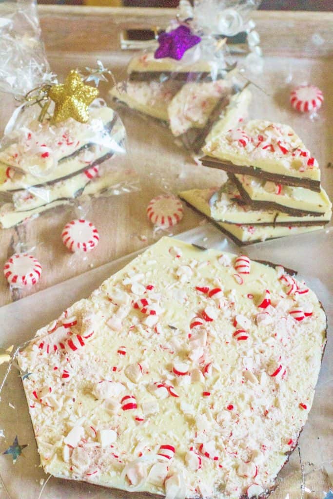 Peppermint Bark is an easy and elegant Christmas gift. It's a cinch to make with only four ingredients and contains layers of  semi-sweet and white chocolate. It's topped with crushed peppermint candy for a festive appearance.