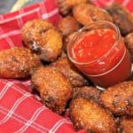 Southern Hushpuppies. Cornmeal batter with added green onions fried until the outsides are golden brown and crispy and the insides are tender. A Southern favorite.