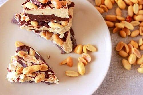Peanut Butter Chocolate Bark. A layer of chocolate and a layer of peanut butter topped with salted peanuts. #chocolate #bark #peanutbutter #peanuts #southernfood