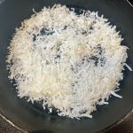 shredded coconut in skillet