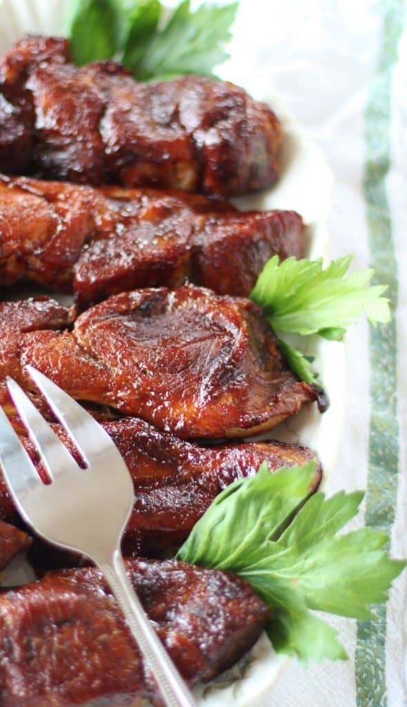 Oven BBQ Country-style Ribs with fork on plate.