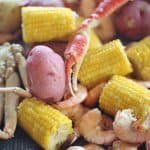 Shrimp and Crab boil with potatoes and corn. A fun, casual meal that's scattered on newspaper down the middle of the table.