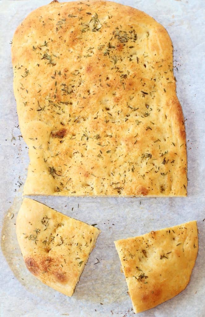 Garlic and Herb Focaccia Bread. Make quick work of this bread by using a frozen dough. #garlic #herb #focaccia #bread