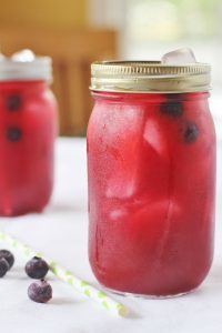 Blueberry Lemonade in a canning jar with ice. 