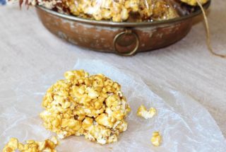 Old Fashioned Popcorn Balls. Freshly popped popcorn balls coated with a butterscotch-y candy coating