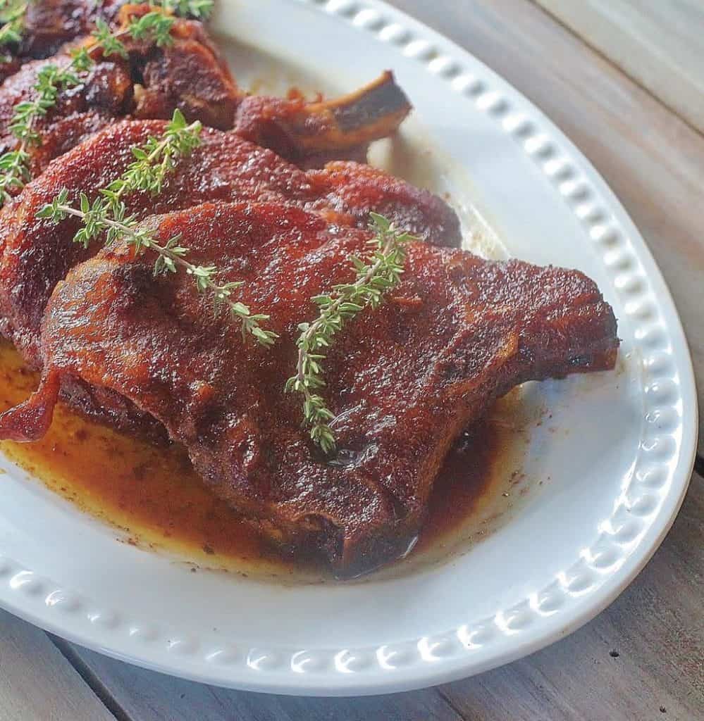 Slow cooker Brown Sugar Pork Chops on plate.