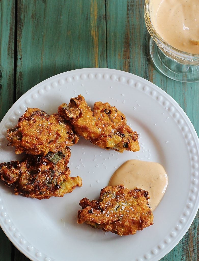 Okra Jalapeno Fritters.  Sliced okra and chopped fresh jalapeno peppers mixed in a batter and fried. Served with Comeback Sauce.