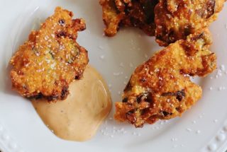 Okra Jalapeno Fritters. Sliced okra and chopped fresh jalapeno peppers mixed in a batter and fried. Served with Comeback Sauce.