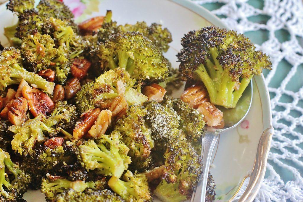 Roasted Broccoli and Pecans. Broccoli florets and pecans tossed in a lemon garlic vinaigrette and roasted until the broccoli starts to brown.