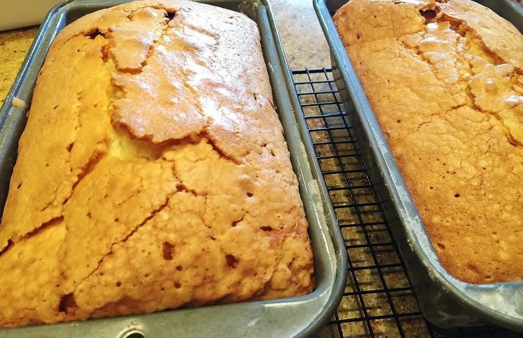 Buttermilk Pound Cakes in baking pans cooling.