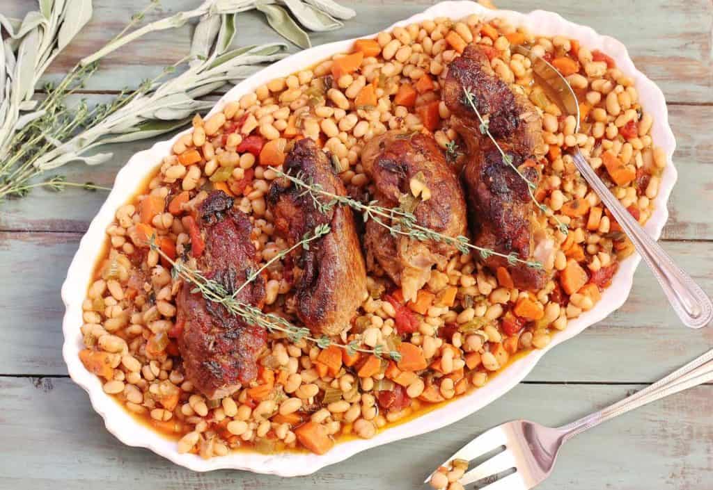 Country-style Ribs and Great Northern Beans. A one pot meal of seasoned boneless country-style meal cooked over a stew of dried beans, onions, carrots, celery, garlic and fresh herbs.