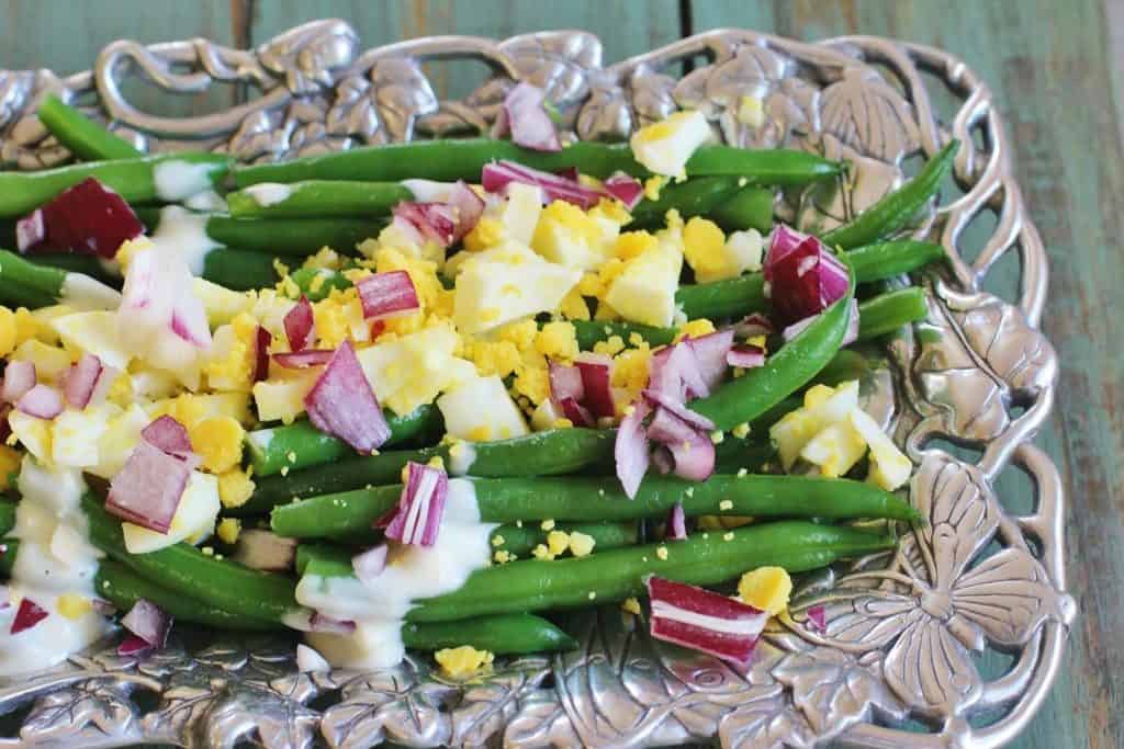 Green Bean Salad. Blanched green beans, boiled eggs, red onion and blue cheese dressing
