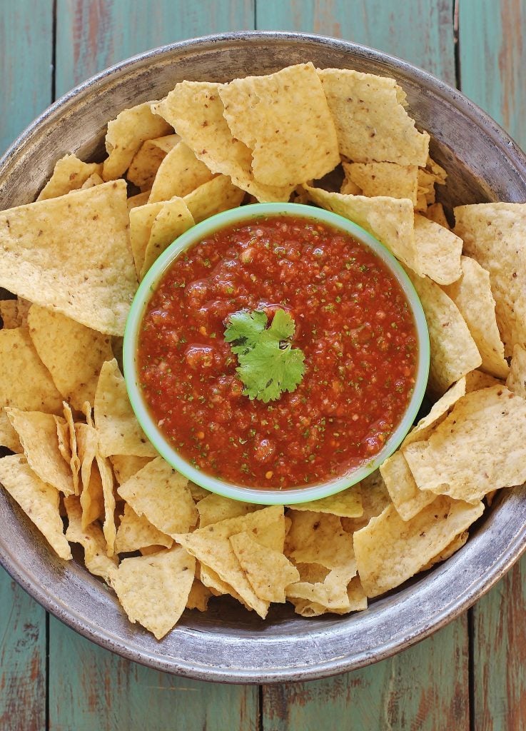 Restaurant Salsa with Chipotle Pepper. A restaurant-style salsa made fresh at home. Chipotle pepper and adobo sauce adds a touch of smokiness.