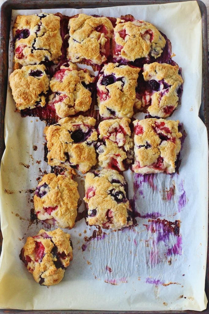 Strawberry Blueberry Biscuits on baking sheet.