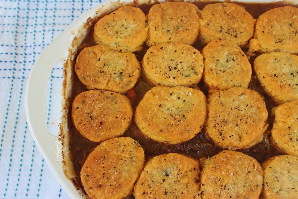 Hamburger Pot Pie with Herb Biscuit Topper. A family friendly meal of ground beef and vegetable filling topped with herb biscuits.