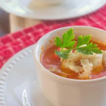 Roasted Red Pepper Tomato Soup with Crab. A twist on a childhood favorite, tomato soup gets updated with the addition of roasted red pepper and a dollop of lump crab meat.