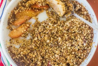 Apple and Plum Oatmeal Crumble. Fresh fruit topped with an oatmeal, butter and brown sugar topping and baked.