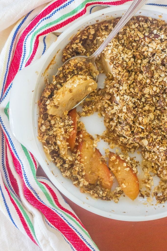 Apple and Plum Oatmeal Crumble. Fresh fruit topped with an oatmeal, butter and brown sugar topping and baked.
