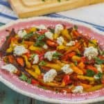 Simple Roasted Sweet Bell Peppers with Herbed Goat Cheese. Colorful and delicious sweet peppers roasted and served with a sprinkling of herbed goat cheese. #freshfromflorida #ad