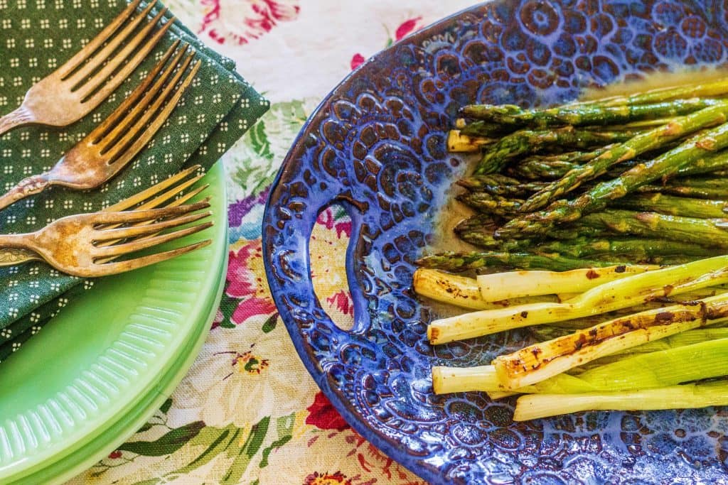 Grilled Asparagus and Spring Onions with Honey Lime Vinaigrette. Fresh asparagus and spring onions are coated in honey lime vinaigrette and quickly grilled.