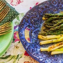Grilled Asparagus and Spring Onions with Honey Lime Vinaigrette. Fresh asparagus and spring onions are coated in honey lime vinaigrette and quickly grilled.