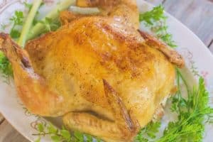 Roasted Whole Chicken is a dish that everyone who cooks chicken needs in their stable of dishes they've perfected. It's roasted simply in a cast iron skillet with a seasoning mix and melted butter.