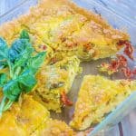 Jalapeno Cheddar Tomato Basil Frittata is a smooth and creamy egg and cheese recipe topped with pickled jalapeno peppers, sun-dried tomatoes,and fresh basil.  Is suited for breakfast, brunch, or as an appetizer.