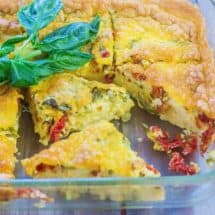 Jalapeno Cheddar Tomato Basil Frittata is a smooth and creamy egg and cheese recipe topped with pickled jalapeno peppers, sun-dried tomatoes,and fresh basil.  Is suited for breakfast, brunch, or as an appetizer.