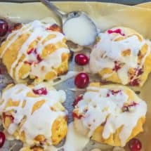 Christmas Cranberry White Chocolate Sour Cream Biscuits are the perfect balance of tart and sweet.  Sour cream makes the texture as light and fluffy as air. No rolling or cutting required.