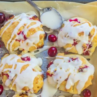 Christmas Cranberry White Chocolate Sour Cream Biscuits are the perfect balance of tart and sweet. Sour cream makes the texture as light and fluffy as air. No rolling or cutting required.