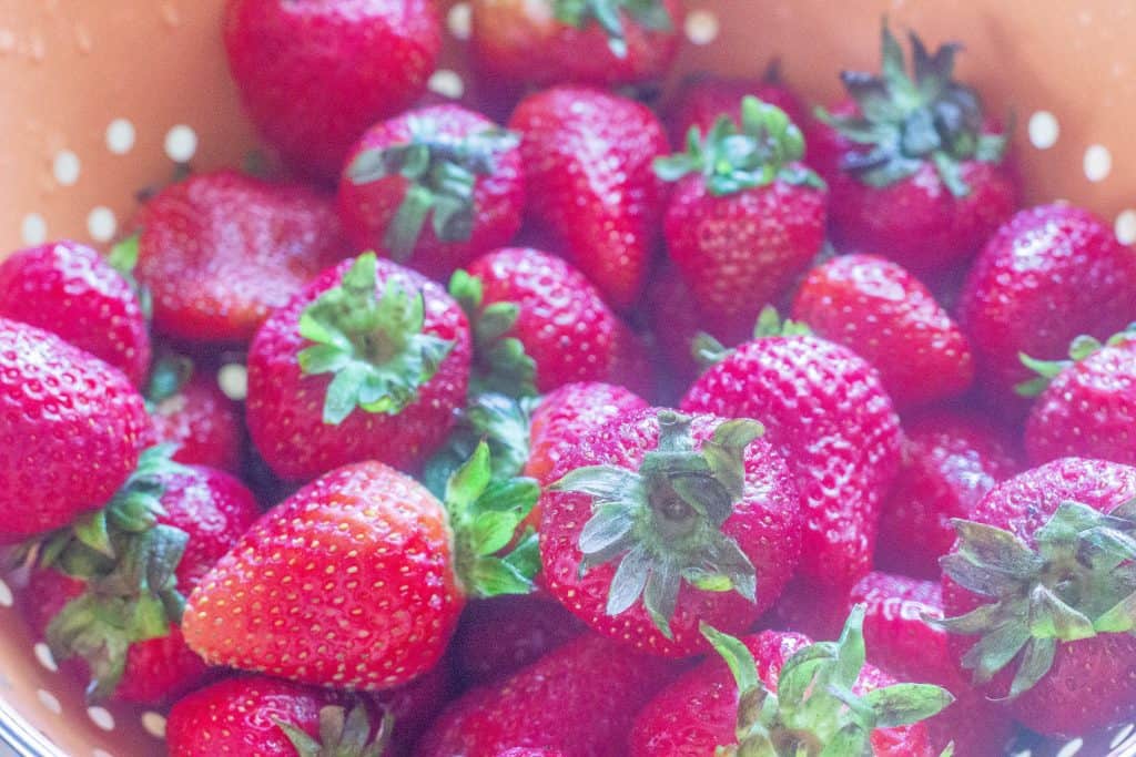 fresh strawberries in strainer