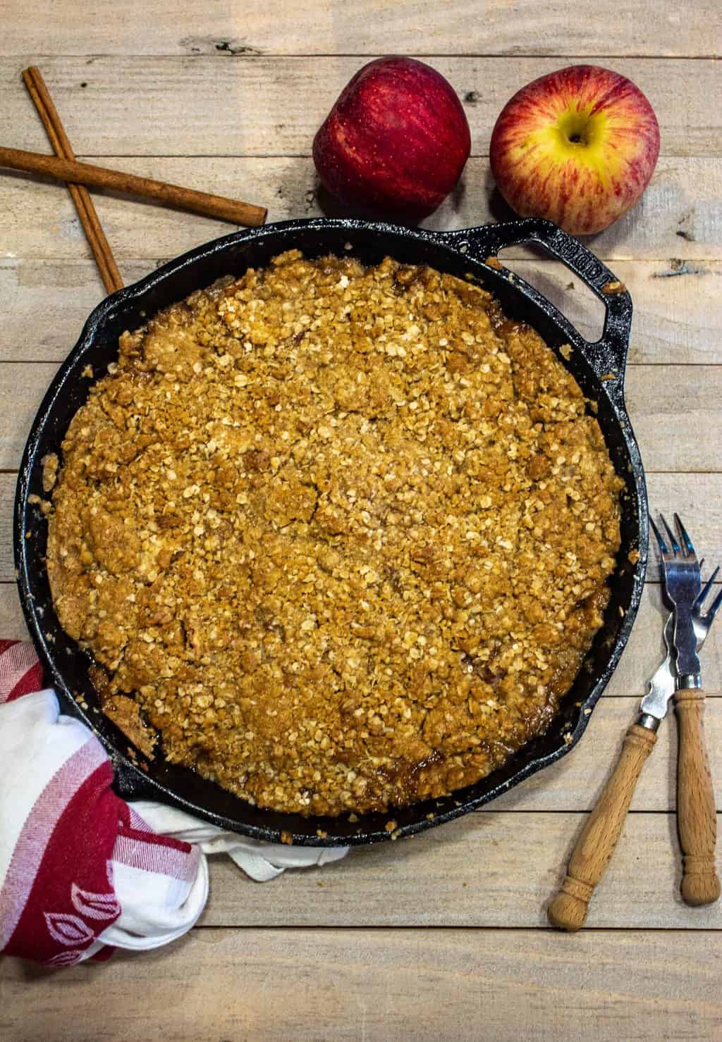 Skillet Apple Crisp is an old fashioned apple dessert made with orchard fresh apples and topped with an oatmeal and brown sugar crumble. 