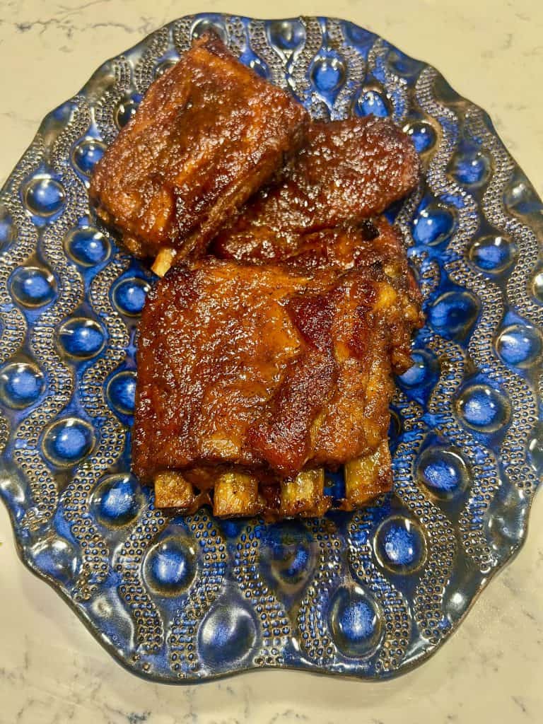 Barbecue spare ribs on a serving platter