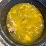 chicken bone broth in a slow cooker